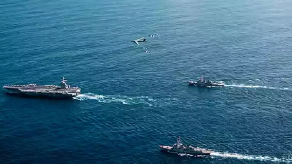 USS Gerald R. Ford aircraft carrier sailing with strike group during US Navy deployment