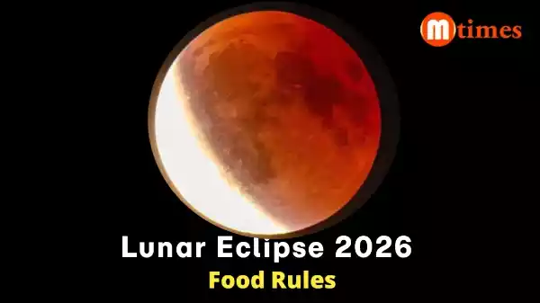 Blood Moon during total lunar eclipse with reddish glow visible in night sky Blood Moon during total lunar eclipse with reddish glow visible in night sky