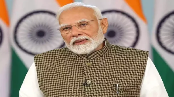 Prime Minister Narendra Modi addressing a public gathering during development project launch in South India