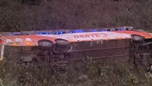 Overturned OSRTC Volvo bus in hilly terrain at Sunki Ghati