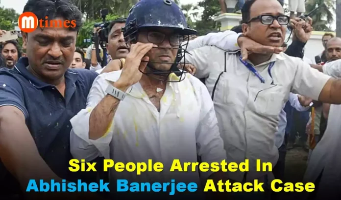 Security personnel escort Abhishek Banerjee after protests and violence during his visit to Sonarpur in South 24 Parganas. Security personnel escort Abhishek Banerjee after protests and violence during his visit to Sonarpur in South 24 Parganas.