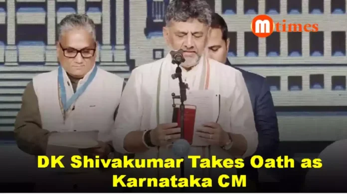 DK Shivakumar takes oath as Karnataka Chief Minister in Bengaluru alongside senior Congress leaders.
