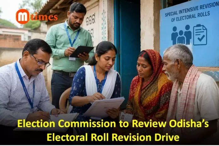 Election officials verifying voter records during the Special Intensive Revision process in Odisha. Election officials verifying voter records during the Special Intensive Revision process in Odisha.