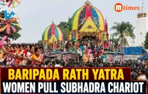 Devotees participating in the Baripada Rath Yatra 2026 as the chariots of Lord Jagannath, Balabhadra and Goddess Subhadra move through Baripada.