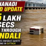 Floodwaters flowing through Mundali Barrage on the Mahanadi River as authorities enforce safety restrictions in Katak