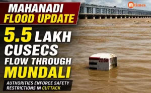 Floodwaters flowing through Mundali Barrage on the Mahanadi River as authorities enforce safety restrictions in Katak