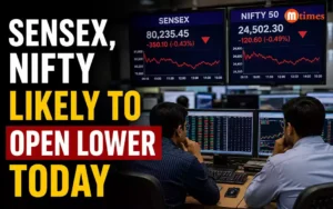 raders monitoring the Sensex and Nifty on trading screens before the market opens.