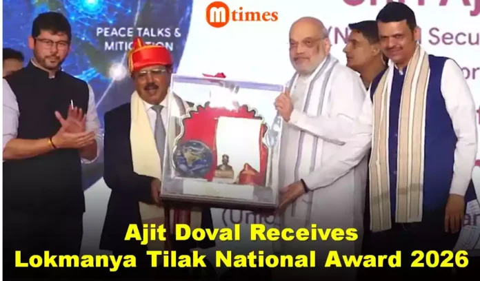 National Security Advisor Ajit Doval receiving the Lokmanya Tilak National Award 2026 from Union Home Minister Amit Shah in Pune.