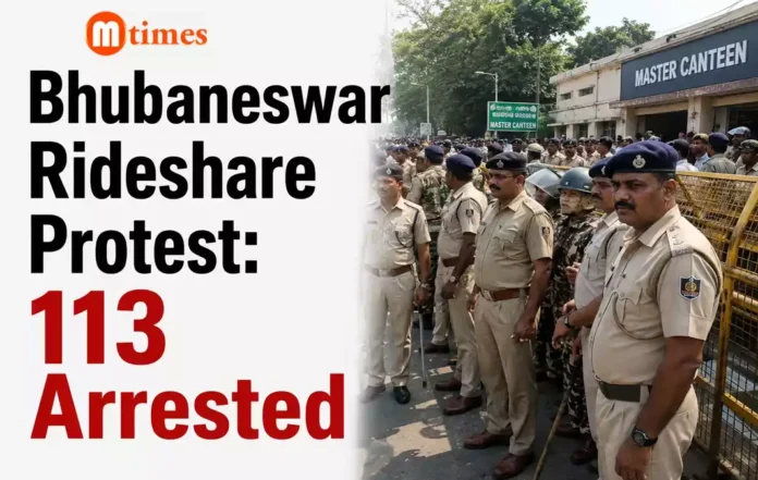 Police personnel deployed during rideshare drivers protest near Master Canteen in Bhubaneswar