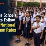 Students singing the National Anthem during a school assembly in Odisha.