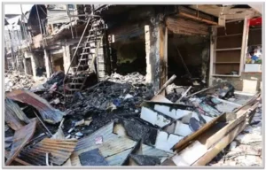 Fire-damaged shops at Shiv Market near Jammu Railway Station.